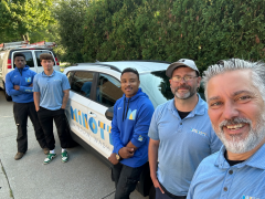 Window washing crew with logo